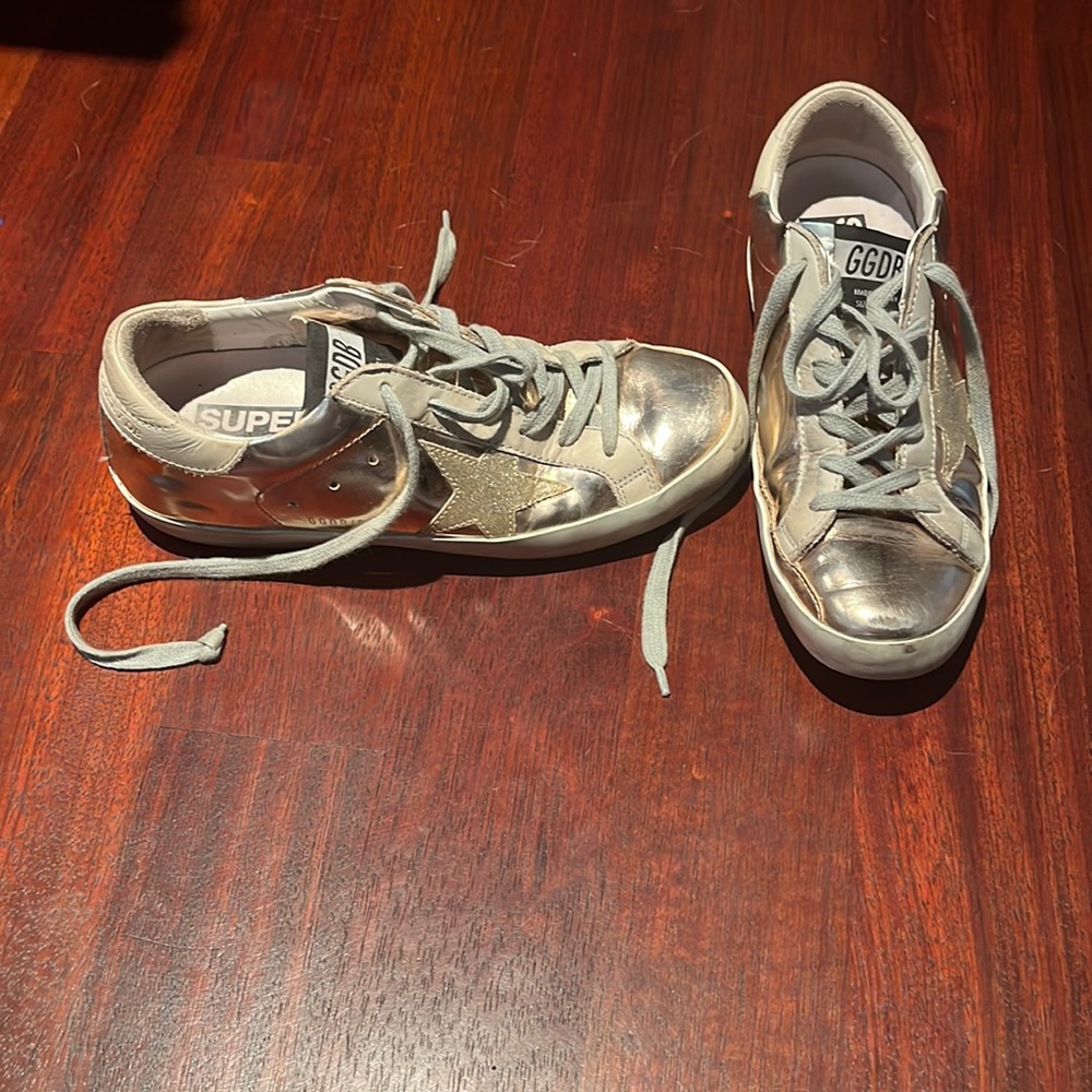 Golden goose size 6 shoe. Rose gold with gold star. Lightly worn